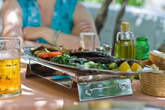 A beautifully arranged fish plate for two people.